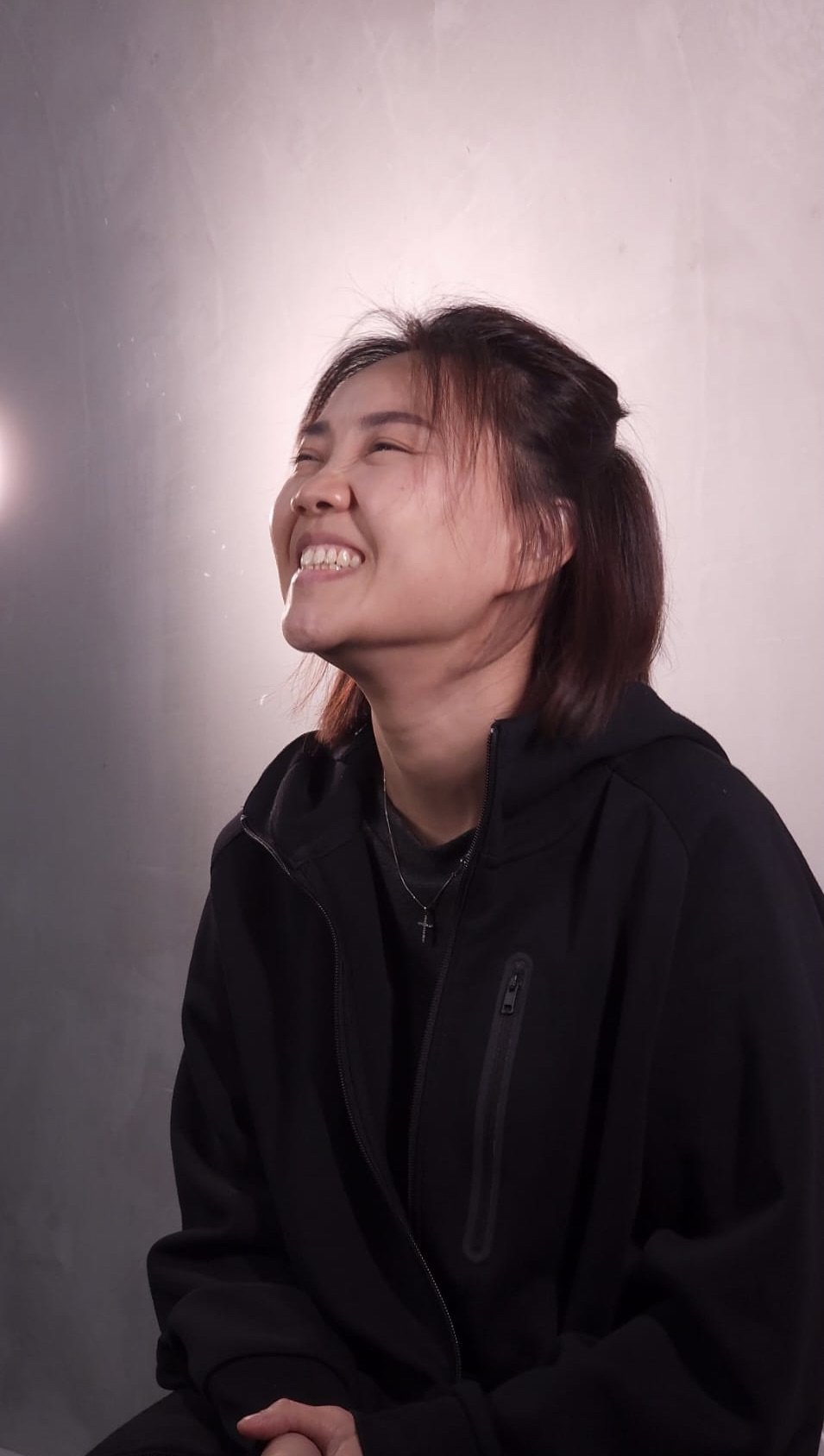 Portrait photo of Faith, a Hustle Student, smiling